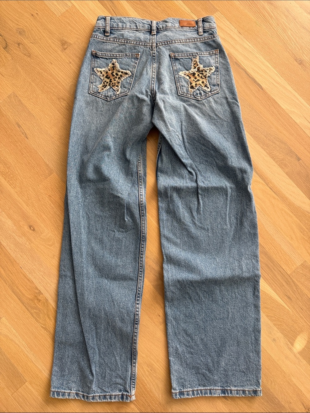 Straight Leg Light Blue Jeans with Leopard Star Pocket Accents